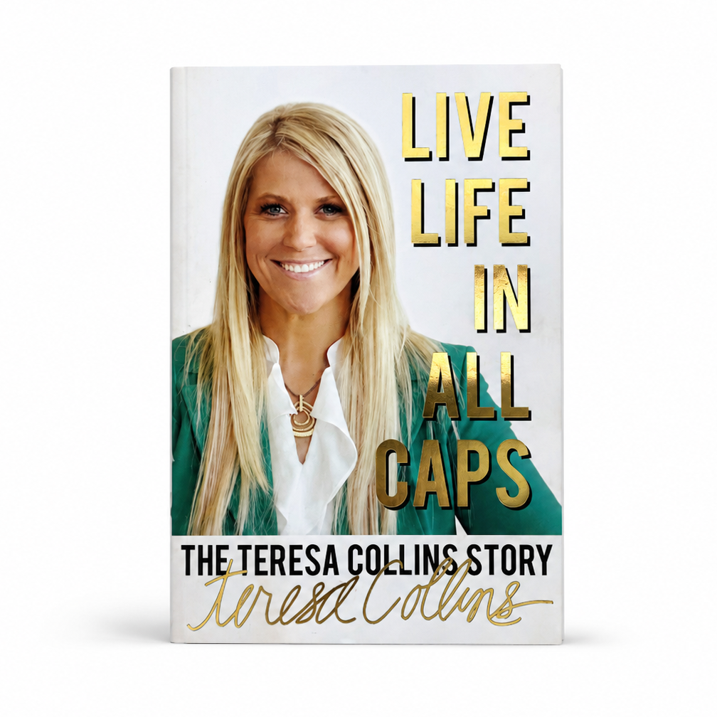 A book cover for 'Live Life in All Caps: The Teresa Collins Story' by Teresa Collins, featuring a portrait of her in a green blazer and white shirt, with bold gold and black text on a white background.